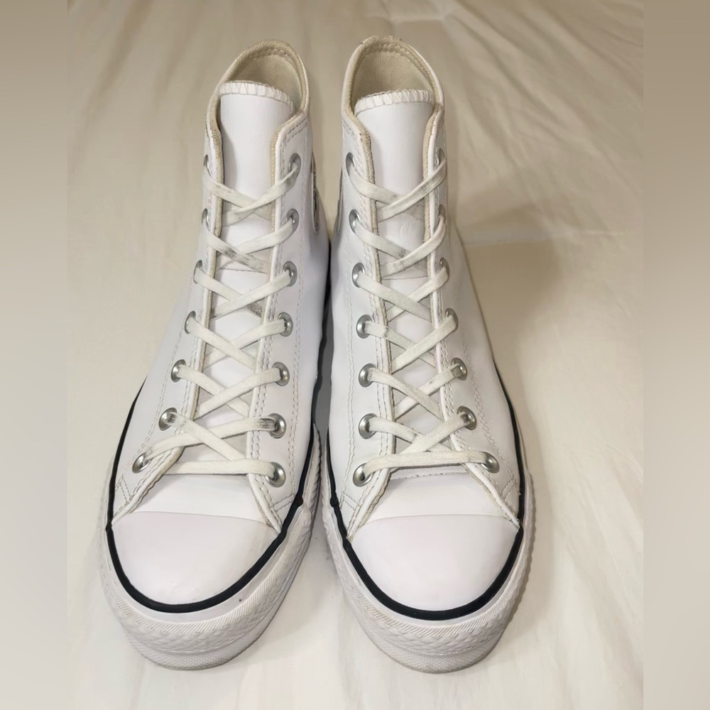 Women’s High Top Platform Converse size 9.5, worn lightly.